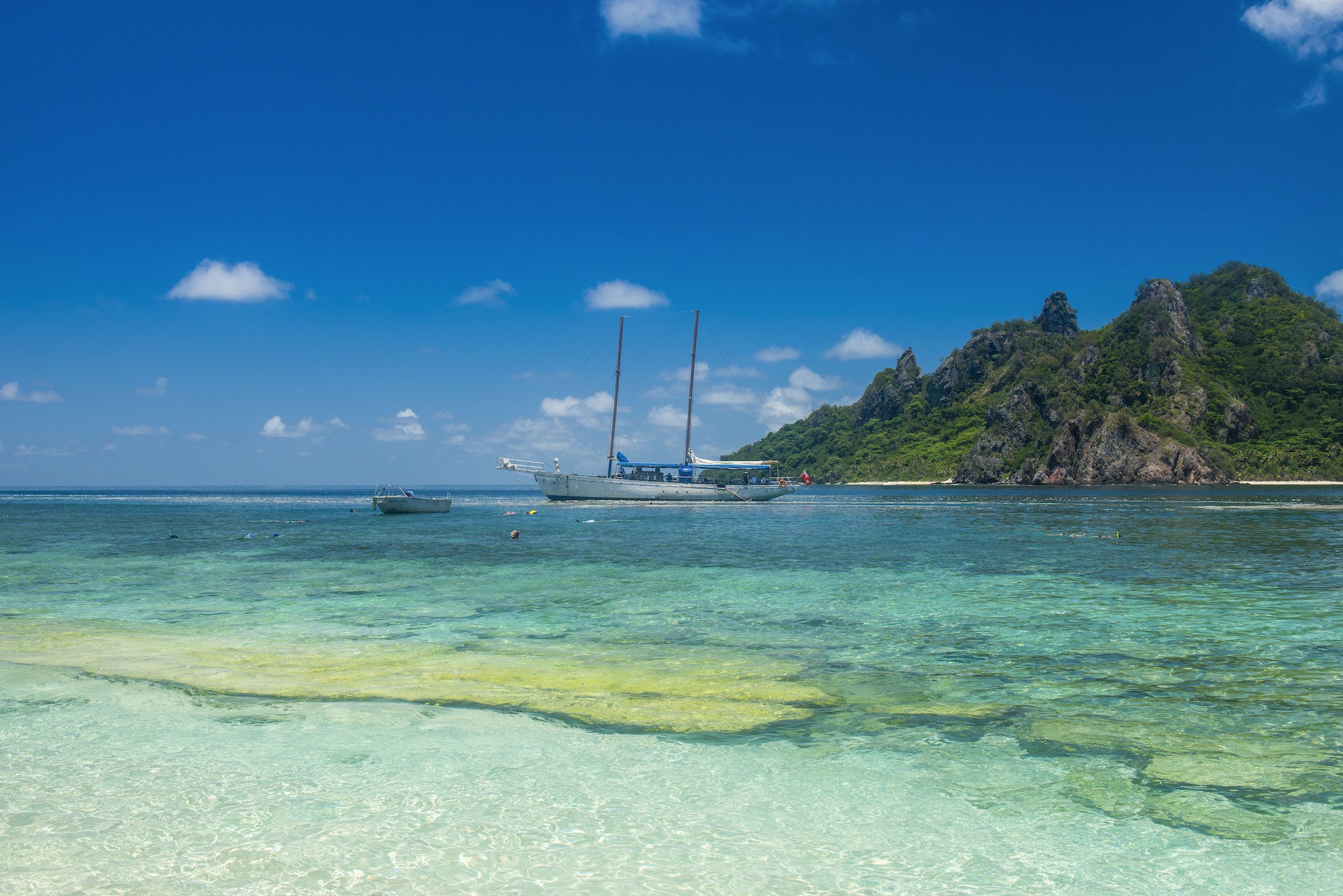 Fiji, Mamanuca islands, Monuriki, turquoise water and boat